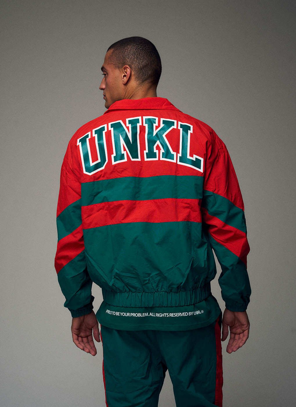 TRACK TEAM SUIT – UNKL Shop